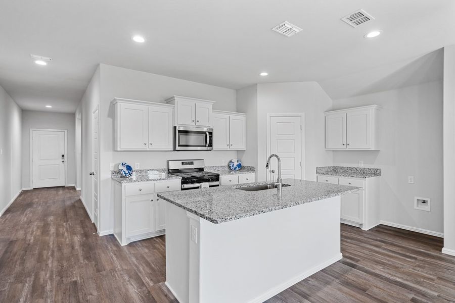 Representative furnished interior of a home built from the TEXAS CALI by D.R. Horton in Faculty Row, Abilene (Image 7).