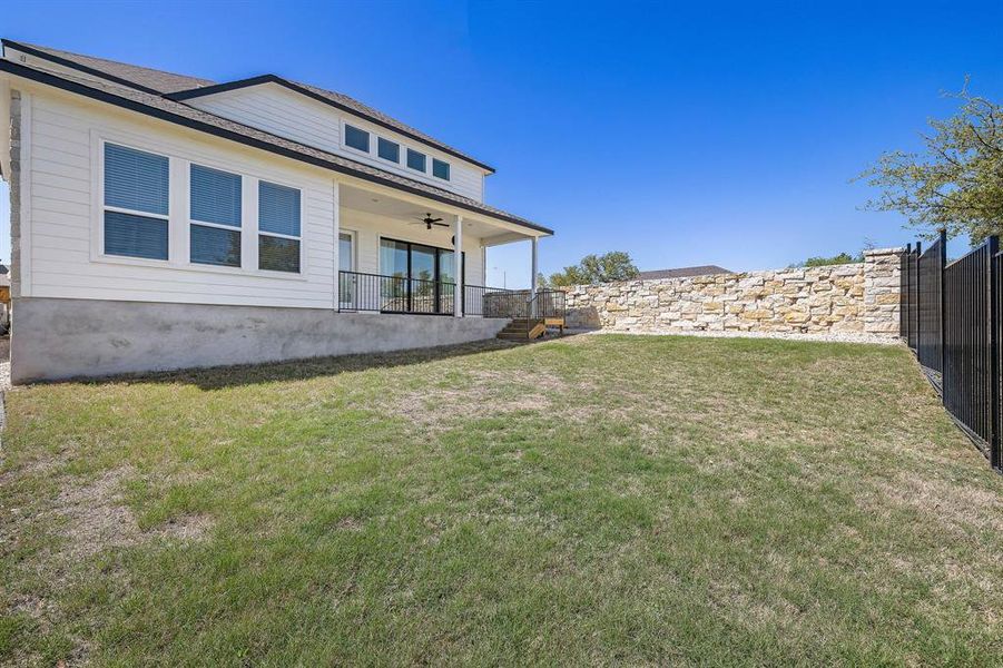 Large covered patio where you can relax and enjoy the greenbelt!