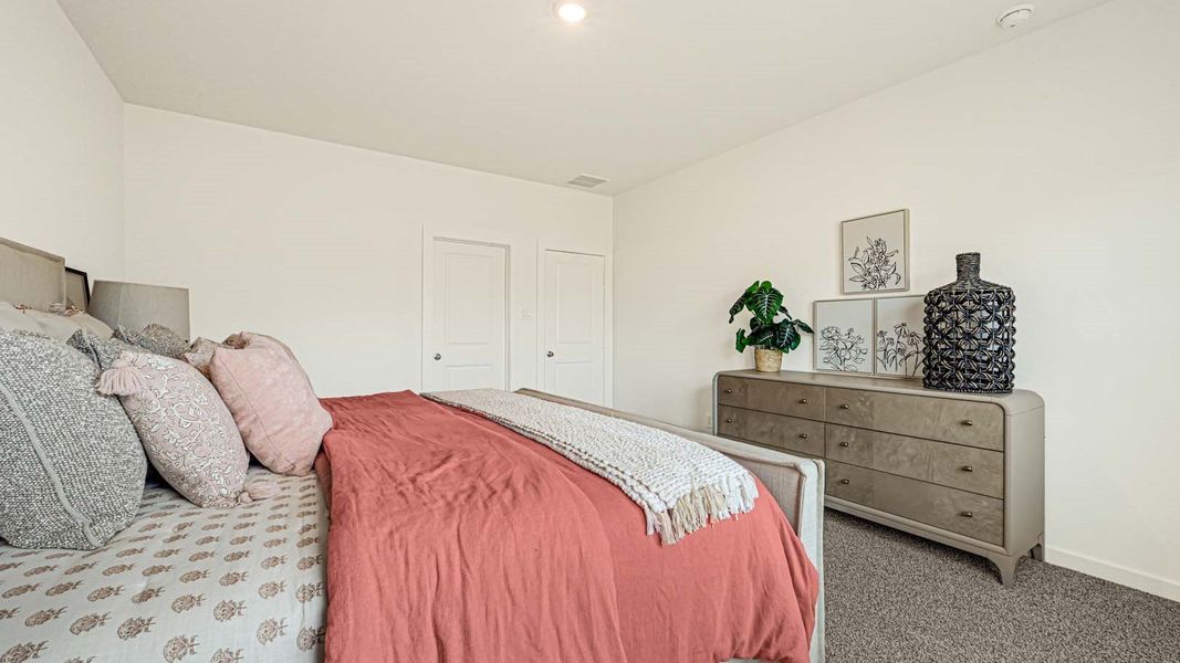 Representative furnished interior of a home built from the Jasmine by D.R. Horton in Holly Ridge, Rosenberg (Image 16).