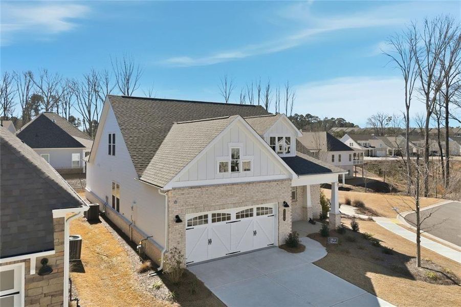 Front exterior of a new home in , Cumming, GA, highlighting curb appeal (Image 27). Front exterior of a new home in , Cumming, GA, highlighting curb appeal (Image 27).