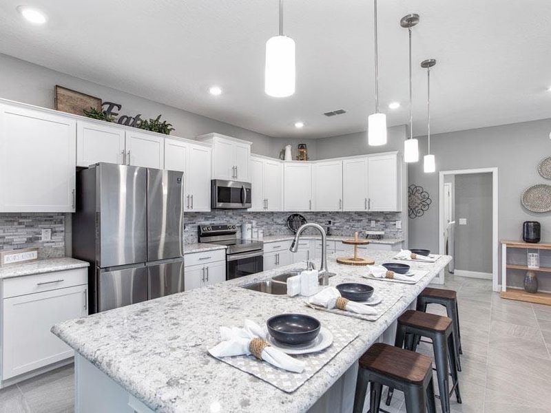 A wide selection of design options are available to personalize your dream kitchen - Waylyn by Highland Homes A wide selection of design options are available to personalize your dream kitchen - Waylyn by Highland Homes