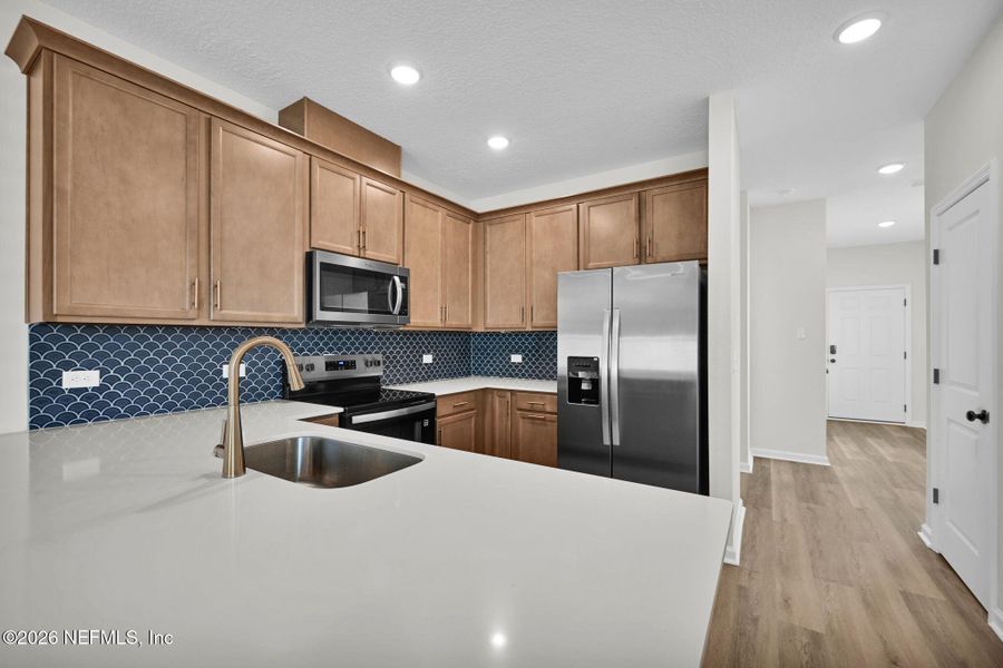 Furnished interior view inside a new home in Baxley Villas, Middleburg (Image 8).
