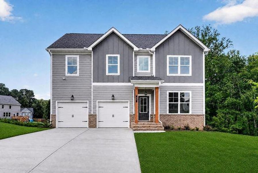 Front exterior of a new home in Austin Ridge, Commerce, GA, highlighting curb appeal (Image 19).