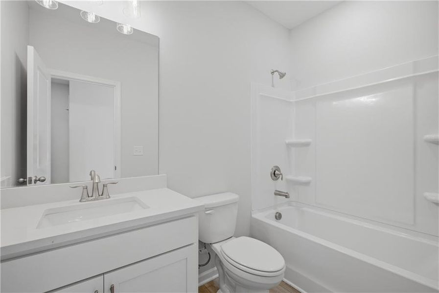 Furnished interior view inside a new home in The Bluffs, Canton (Image 10).