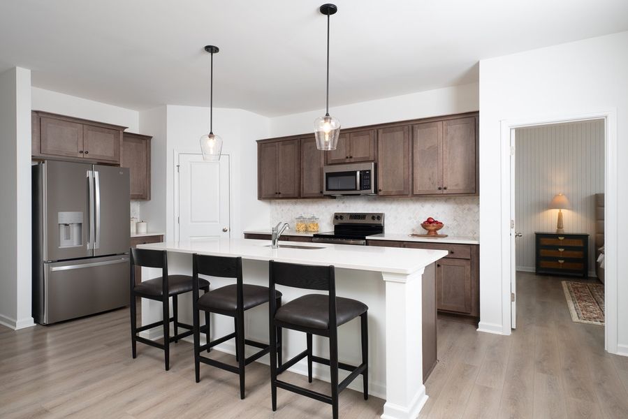 Representative furnished interior of a home built from the Forrest by Ashton Woods in Middleton Farms, Middlesex (Image 3).
