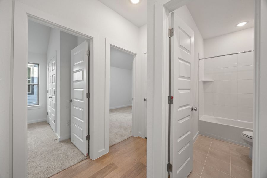Hallway in the Turquoise home plan by Trophy Signature Homes – REPRESENTATIVE PHOTO