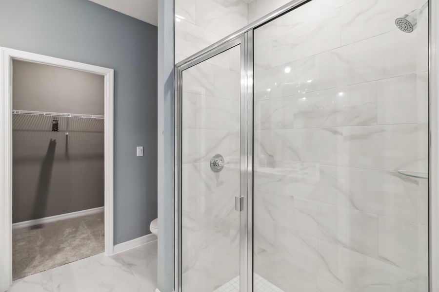 Primary Shower with Floor to Ceiling Tile