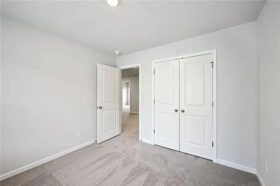 Spacious, unfurnished interior of a new home in The Hills at Cedar Creek, Winder (Image 23).