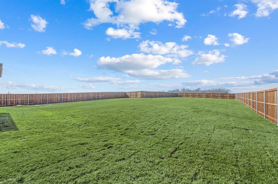Exterior details and patio area of a home in Settlers Glen, New Fairview (Image 25).