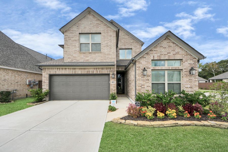 This beautiful two-story home features 4 bedrooms, 3 bathrooms, and a game room!