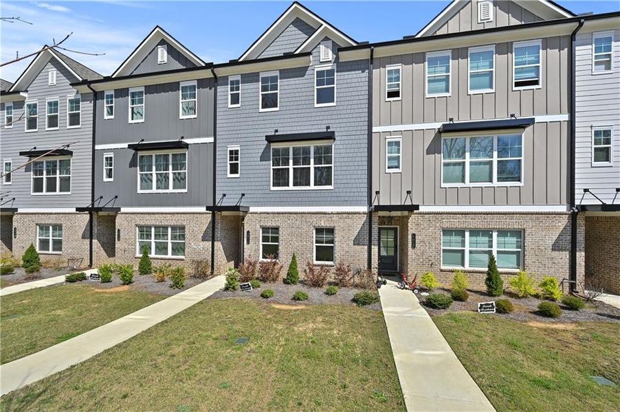 Front exterior of a new home in , Sugar Hill, GA, highlighting curb appeal (Image 26).