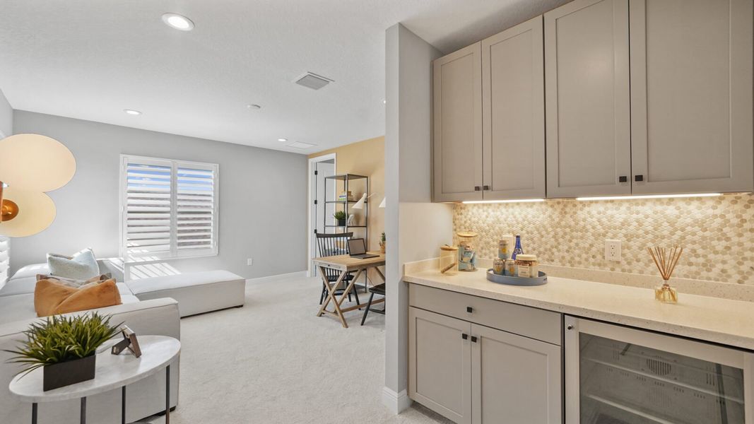 Representative furnished interior of a home built from the Sea Mist by Neal Communities in Vistera of Venice, Venice (Image 25).