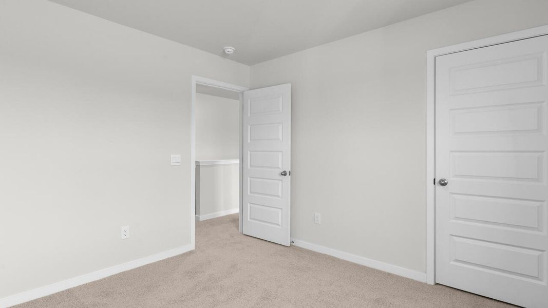 Spacious, unfurnished interior of a new home in Cedar Hill Landing, Navassa (Image 31). Spacious, unfurnished interior of a new home in Cedar Hill Landing, Navassa (Image 31).