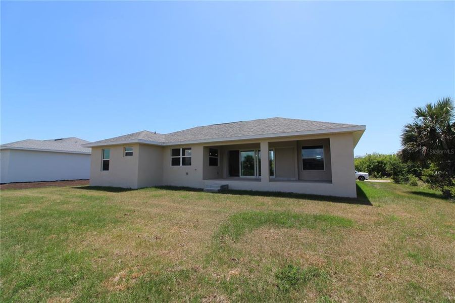 Front exterior of a new home in , Port Charlotte, FL, highlighting curb appeal (Image 10). Front exterior of a new home in , Port Charlotte, FL, highlighting curb appeal (Image 10).