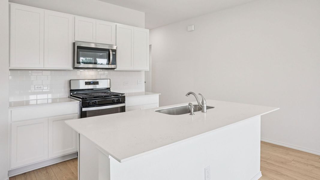 Furnished interior view inside a new home in Carillon, Manor (Image 6).