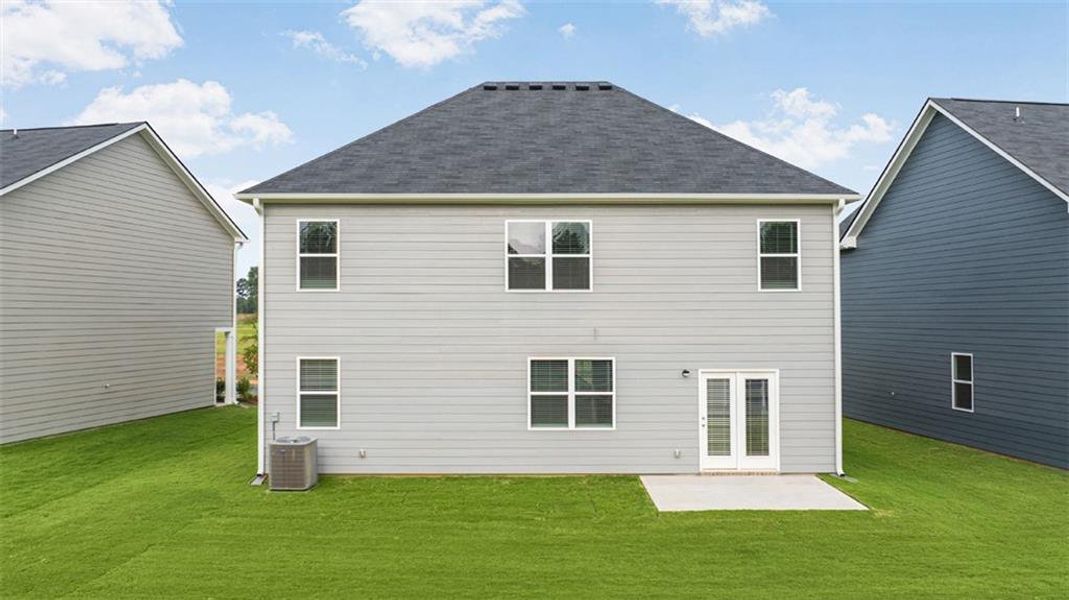 Exterior details and patio area of a home in Teamon Pointe, Griffin (Image 2).