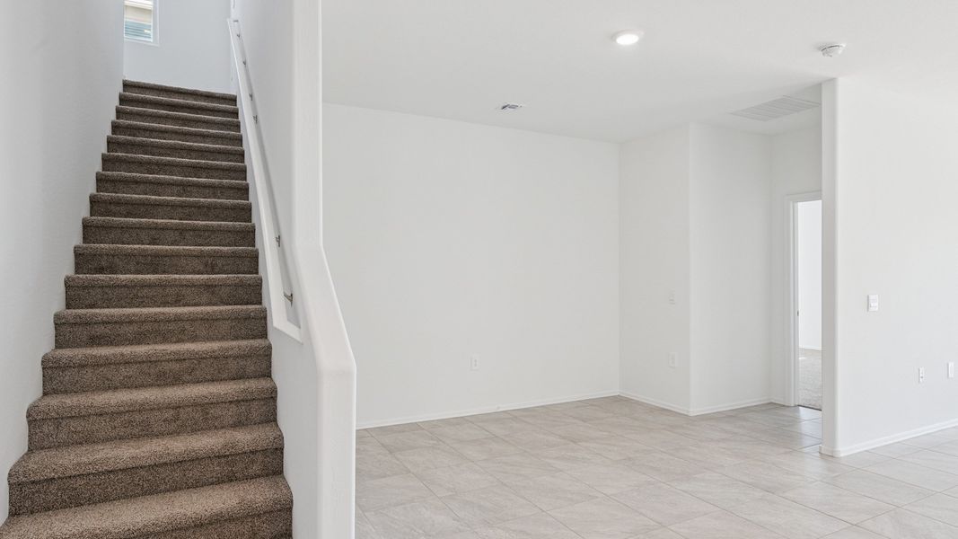 Representative unfurnished interior of a home built from the Ibis by D.R. Horton in Elena Trails, Maricopa (Image 13).