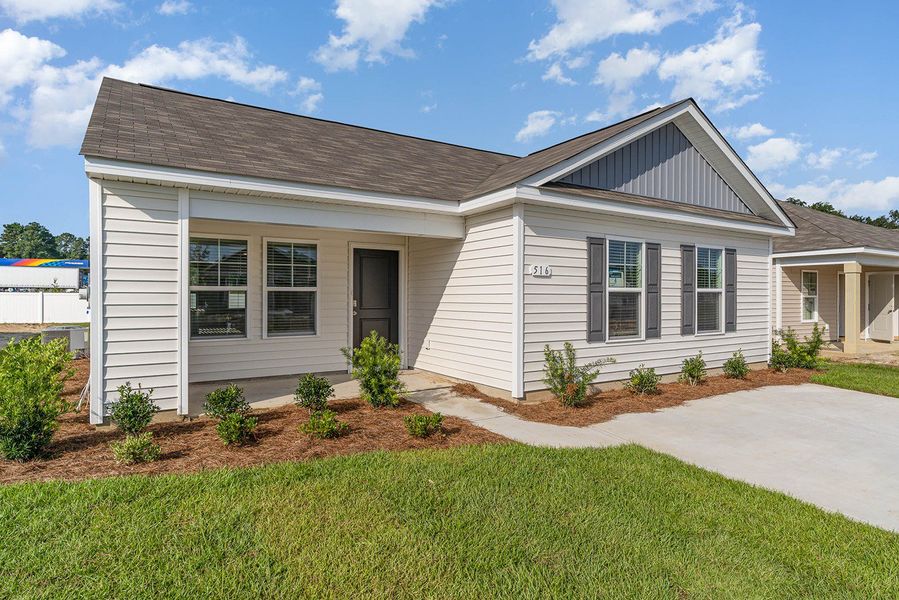 Representative exterior photo of a completed home built from the CURTIS by D.R. Horton in Auberon Woods, Conway, SC (Image 16).
