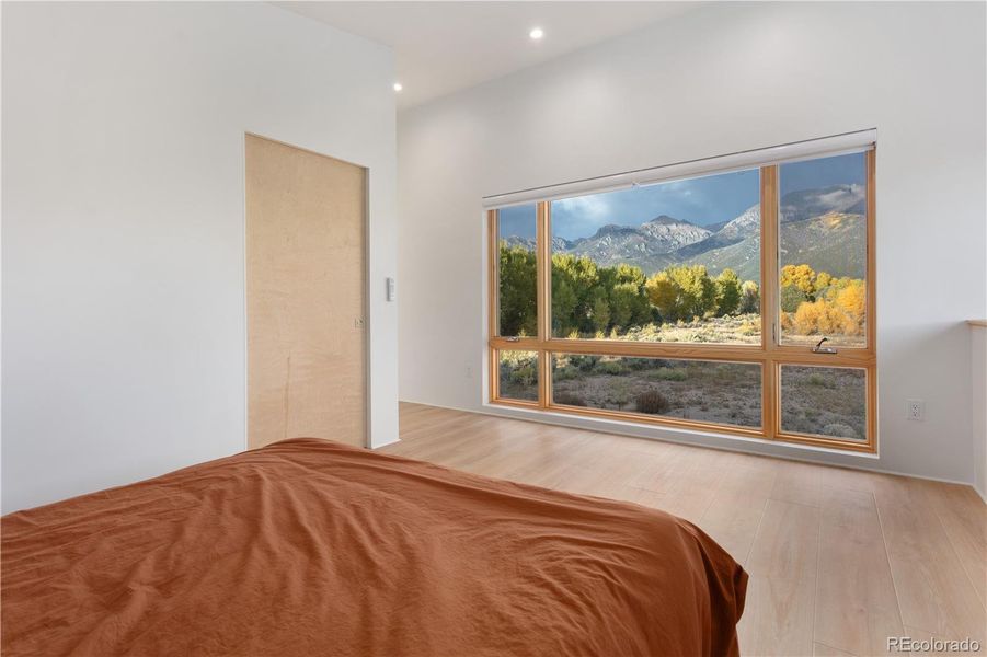 Eastern views from primary bedroom of Unit 2.