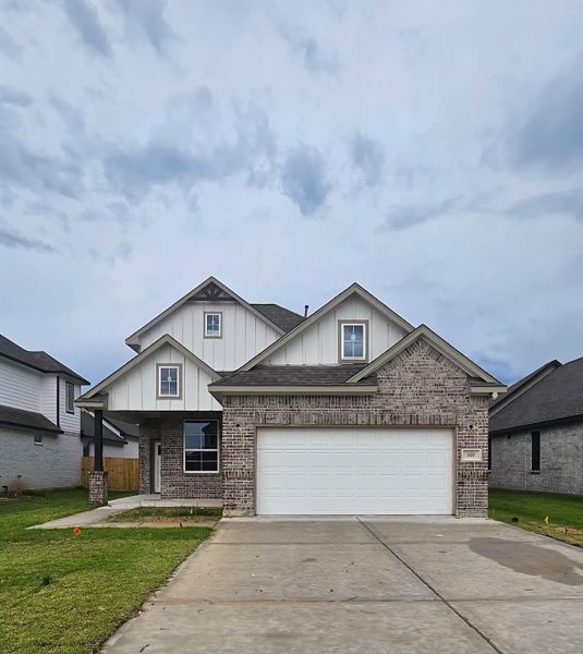 Front exterior of a new home in , Anahuac, TX, highlighting curb appeal (Image 1). Front exterior of a new home in , Anahuac, TX, highlighting curb appeal (Image 1).