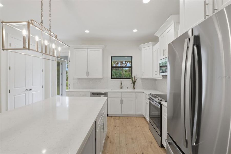 Furnished interior view inside a new home in , Port Charlotte (Image 13).