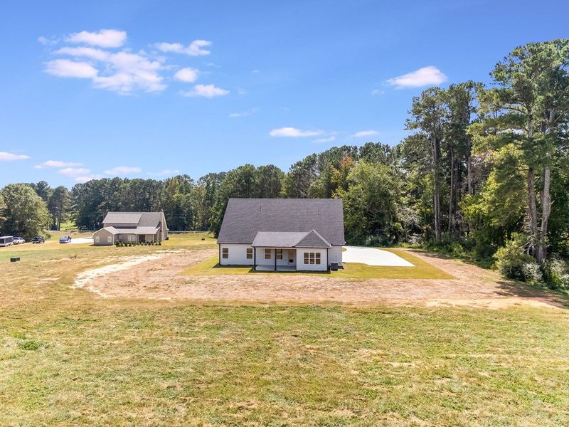 Front exterior of a new home in LOVVORN ESTATES, Carrollton, GA, highlighting curb appeal (Image 29).