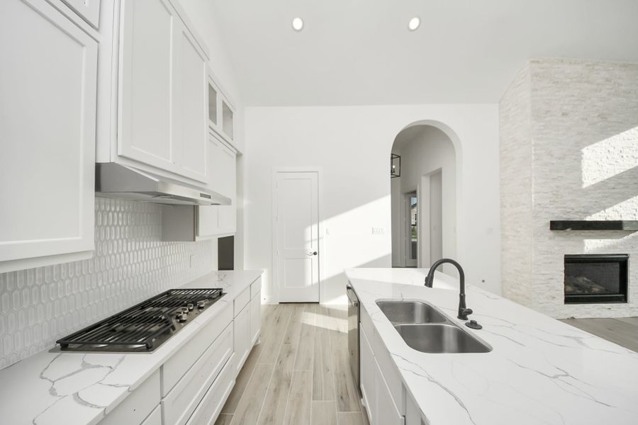 Furnished interior view inside a new home in Meridiana, Manvel (Image 12).