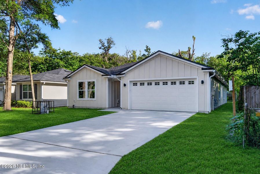 Front exterior of a new home in , Jacksonville, FL, highlighting curb appeal (Image 2). Front exterior of a new home in , Jacksonville, FL, highlighting curb appeal (Image 2).