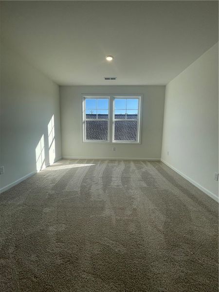 Spacious, unfurnished interior of a new home in Springwood Grove, Central (Image 34).