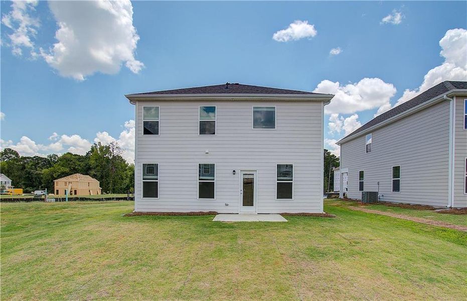 Exterior details and patio area of a home in Enclave at Evergreen, Fairburn (Image 4). Exterior details and patio area of a home in Enclave at Evergreen, Fairburn (Image 4).