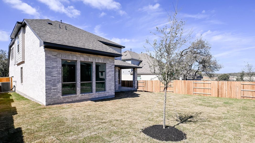Exterior details and patio area of a home in 6 Creeks, Kyle (Image 18).
