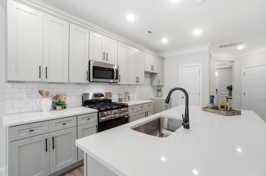 Furnished interior view inside a new home in Harrisburg Village Townhomes, Harrisburg (Image 13).