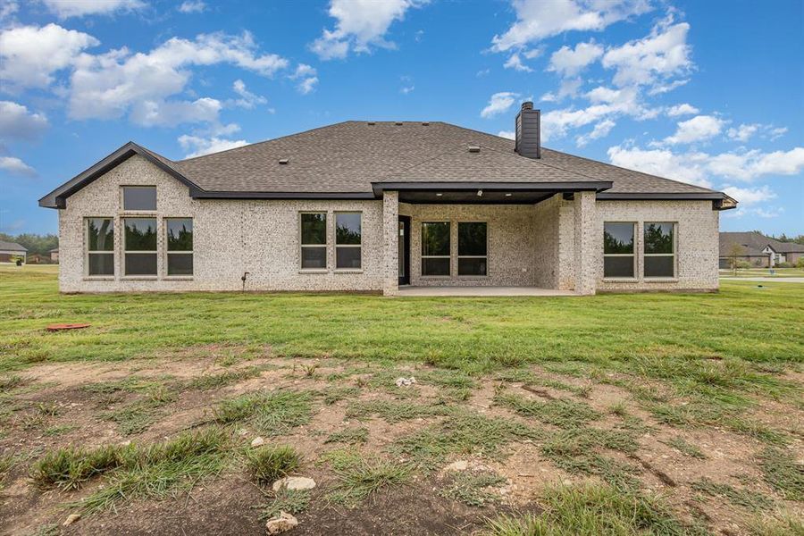 Front exterior of a new home in Sagebrush Addition, Midlothian, TX, highlighting curb appeal (Image 20).