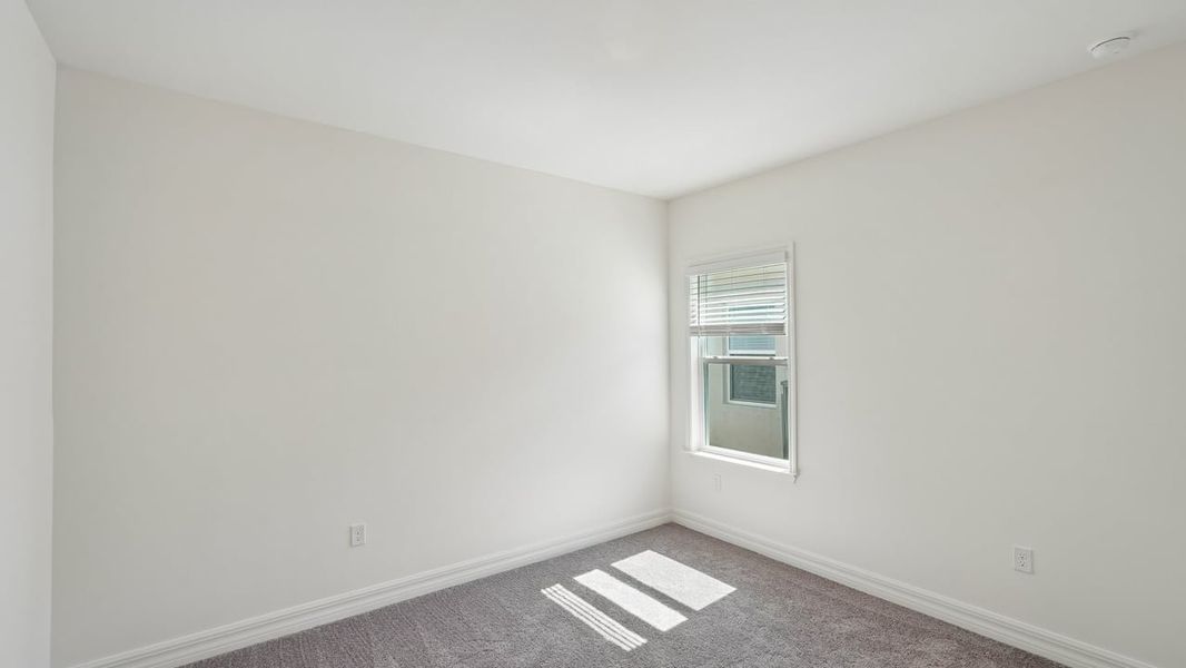 Spacious, unfurnished interior of a new home in Heritage Station, Punta Gorda (Image 40).