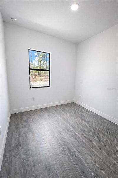 Spacious, unfurnished interior of a new home in , Port Charlotte (Image 12).