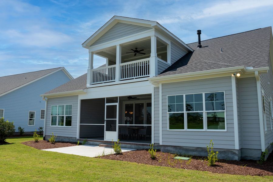 Representative exterior photo of a completed home built from the Ashton by Bill Clark Homes in Osprey Landing, Southport, NC (Image 25). Representative exterior photo of a completed home built from the Ashton by Bill Clark Homes in Osprey Landing, Southport, NC (Image 25).