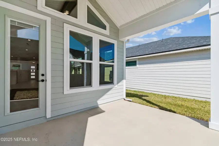 Exterior details and patio area of a home in Crosswinds 40’, Ponte Vedra (Image 2).