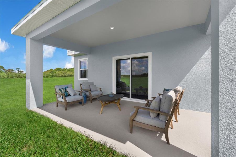 Exterior details and patio area of a home in Oakfield Trails, Parrish (Image 27).