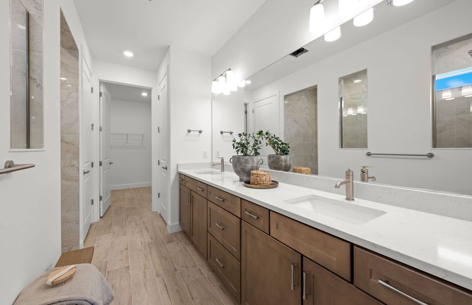Representative furnished interior of a home built from the Palmary by DiVosta in BeachWalk by Manasota Key, Englewood (Image 17).