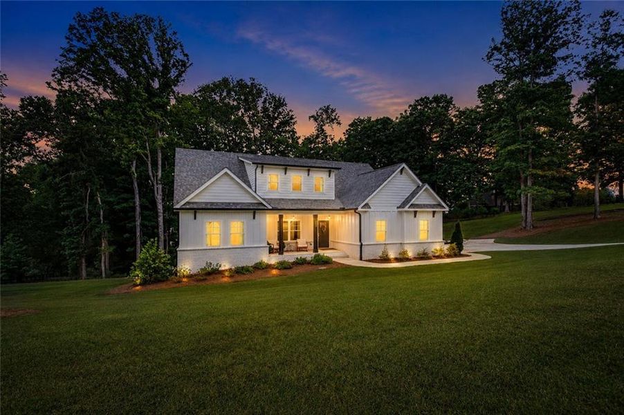 Front exterior of a new home in , Hoschton, GA, highlighting curb appeal (Image 21). Front exterior of a new home in , Hoschton, GA, highlighting curb appeal (Image 21).