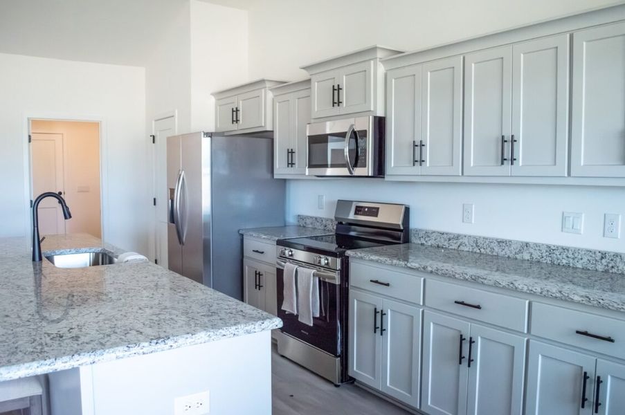 Furnished interior view inside a new home in Parkland Place, Pace (Image 8).