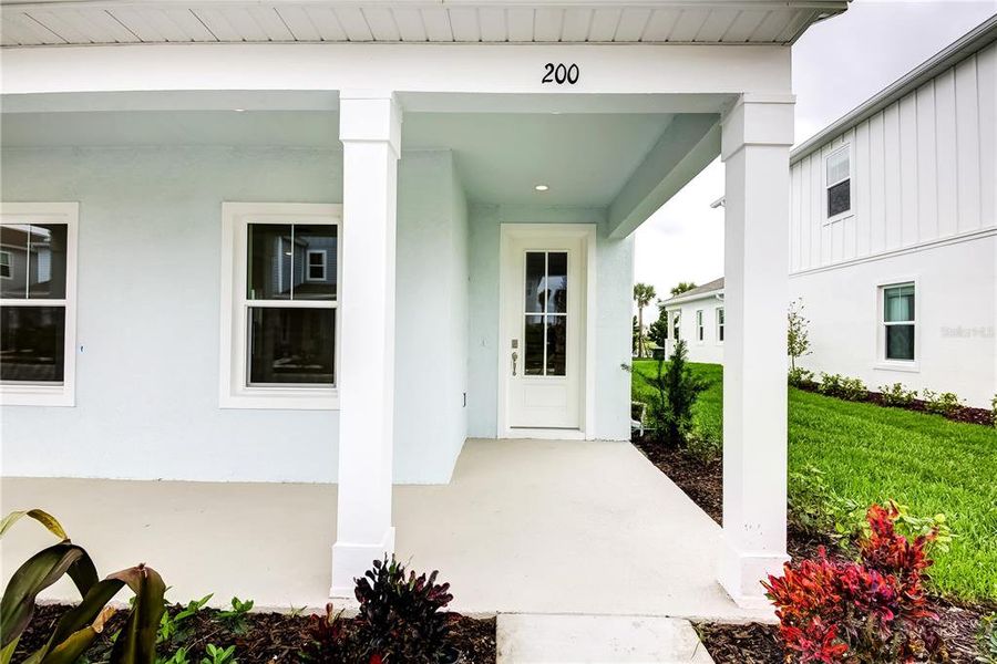 Exterior details and patio area of a home in Bungalow Walk at Lakewood Ranch, Sarasota (Image 22).