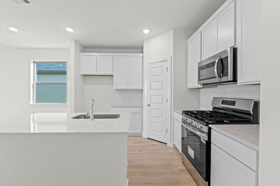 Furnished interior view inside a new home in Prairie Winds, Hutto (Image 10).