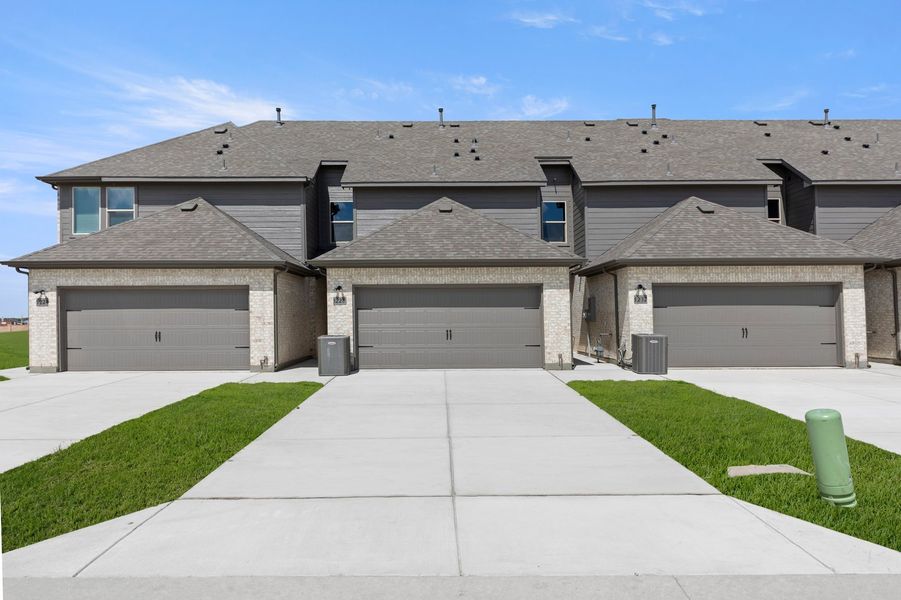 Front exterior of a new home in Creekshaw, Royse City, TX, highlighting curb appeal (Image 27).