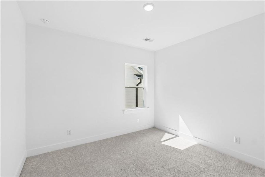 Spacious, unfurnished interior of a new home in Maple Grove at Towne Lake, Woodstock (Image 16).
