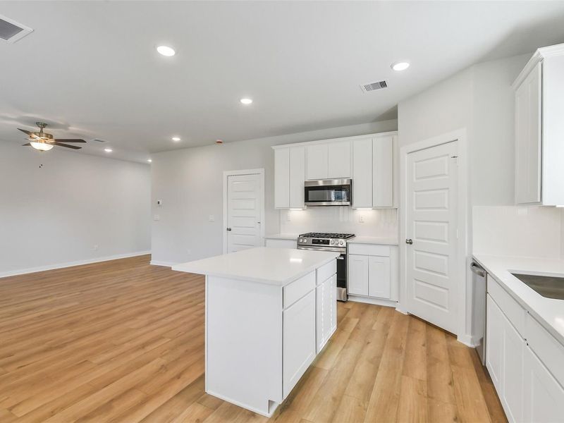 Furnished interior view inside a new home in Lakes at Black Oak, Magnolia (Image 10).