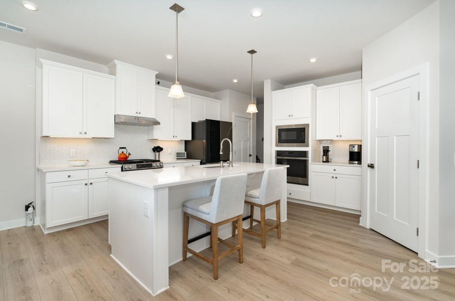 Furnished interior view inside a new home in , Monroe (Image 27).