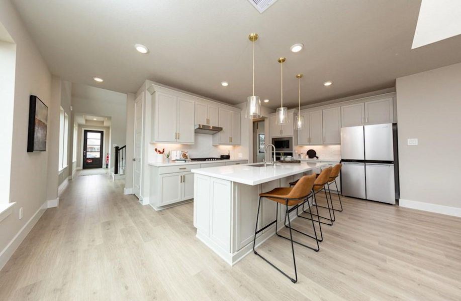 Furnished interior view inside a new home in Ellwood: Signature Collection, Iowa Colony (Image 9). Furnished interior view inside a new home in Ellwood: Signature Collection, Iowa Colony (Image 9).