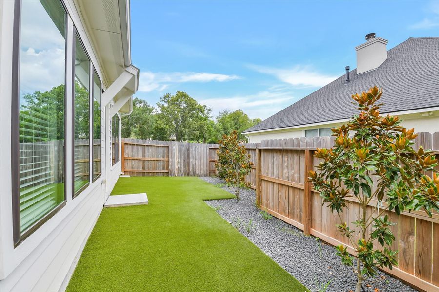 Exterior details and patio area of a home in Summer Place 35', Montgomery (Image 3). Exterior details and patio area of a home in Summer Place 35', Montgomery (Image 3).