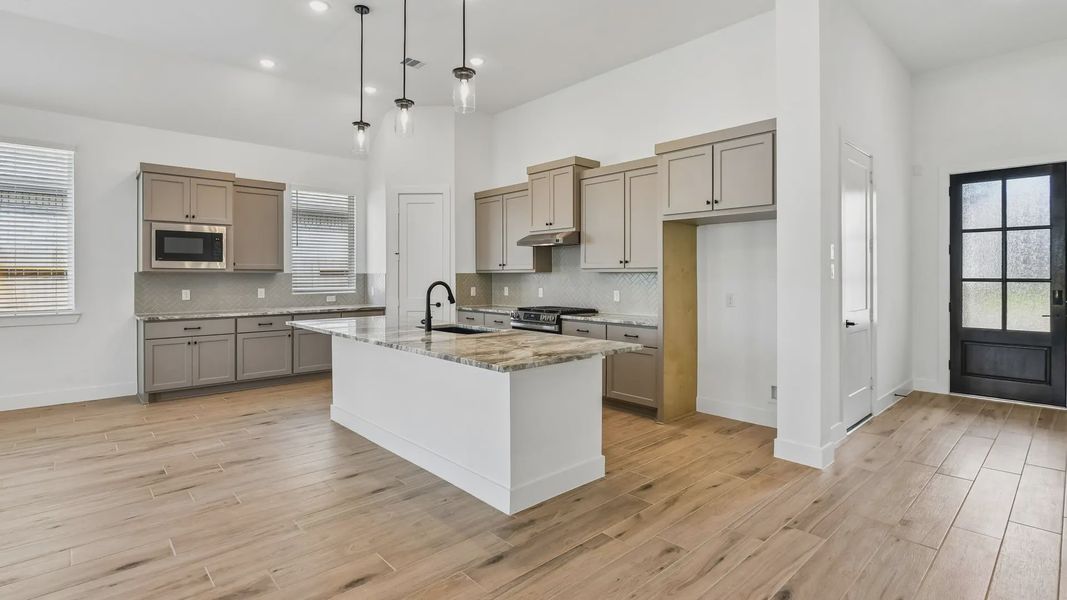 Furnished interior view inside a new home in Artavia, Conroe (Image 8).